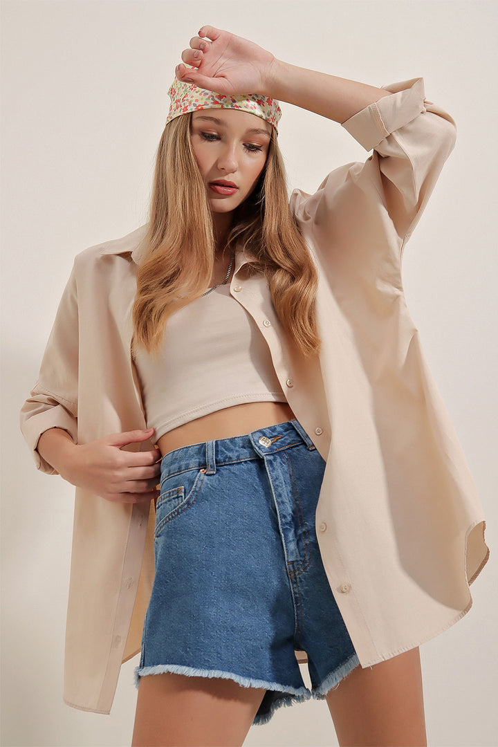 قميص كريمي نسائي