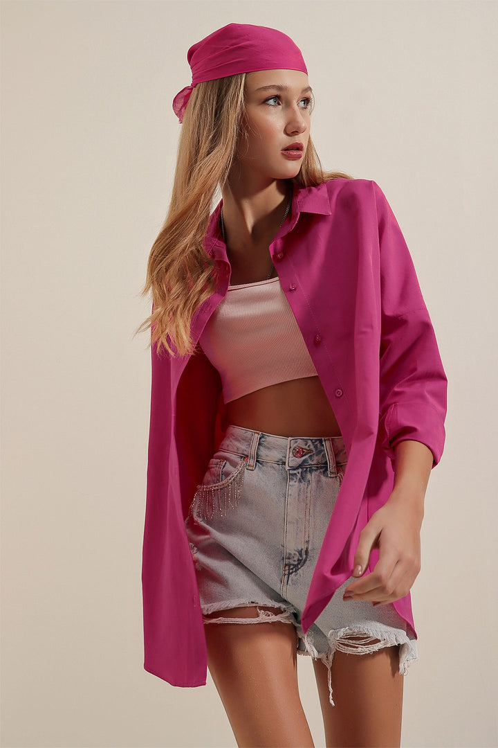 قميص نسائي باللون الوردي الداكن