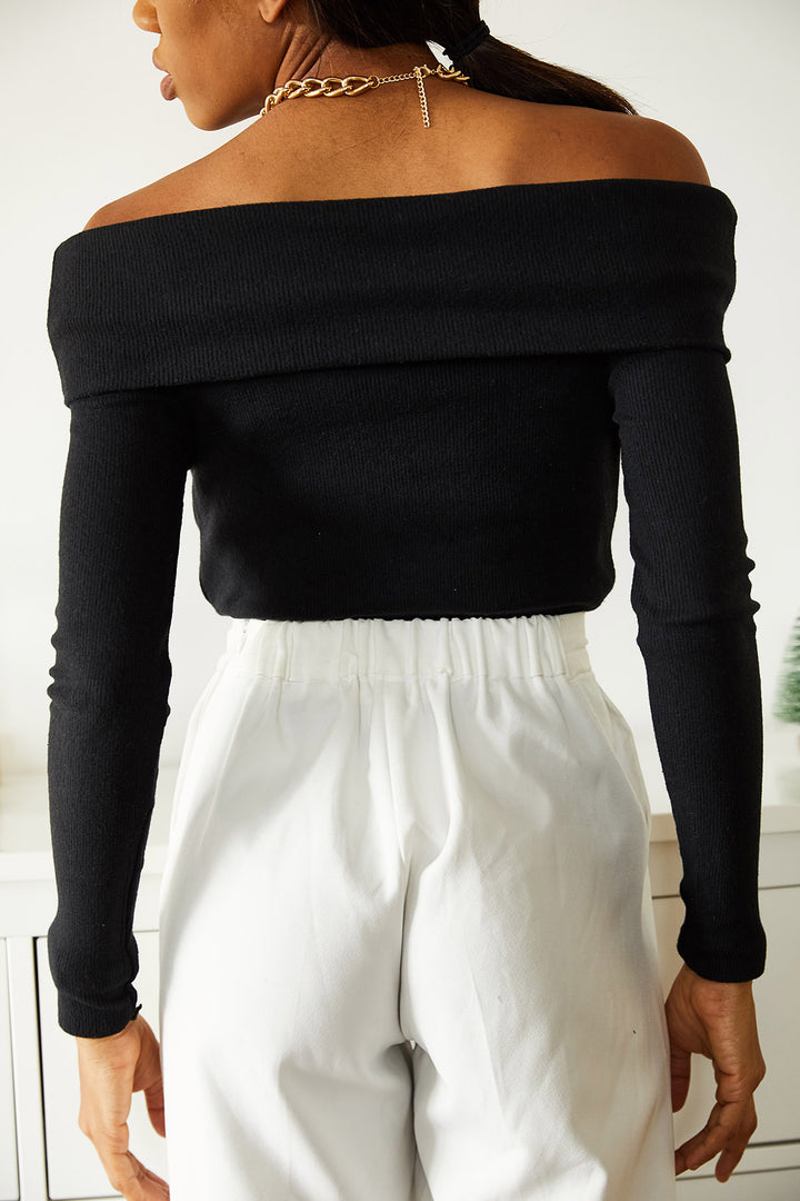 سترة سوداء بأكمام طويلة من مادونا