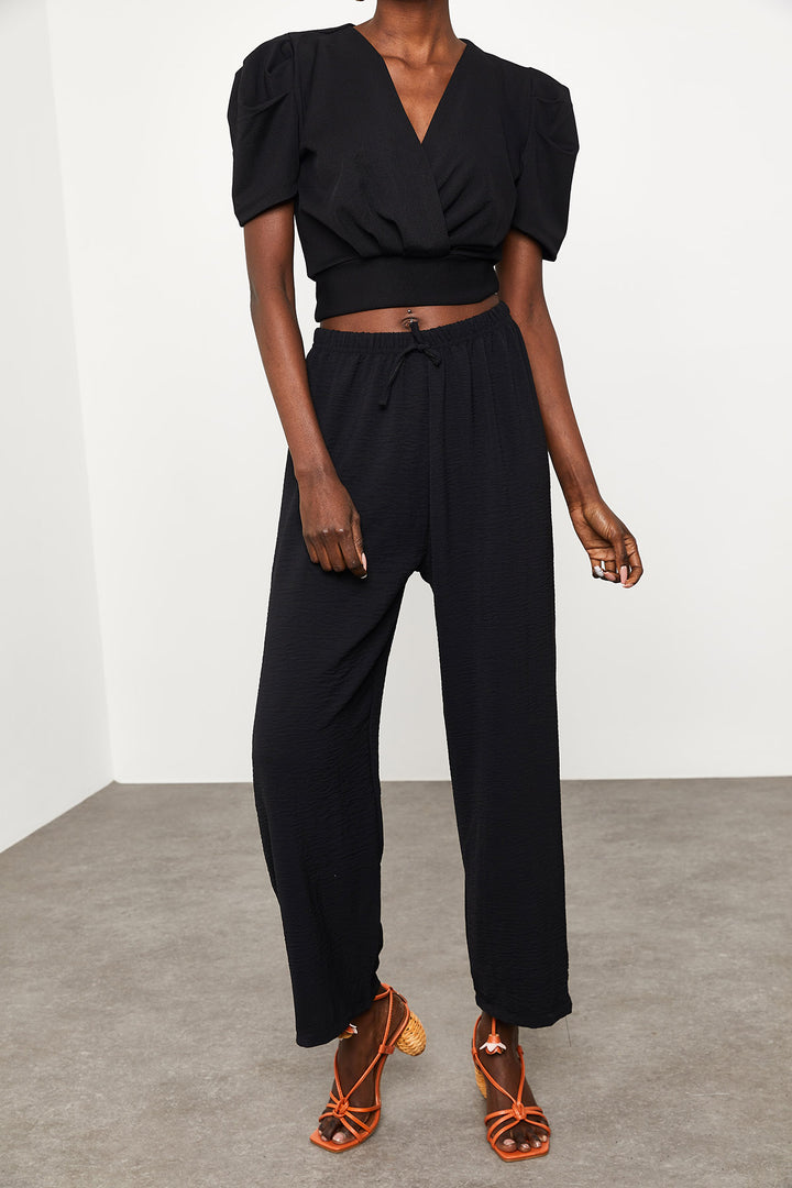 بنطلون كتان أسود فضفاض