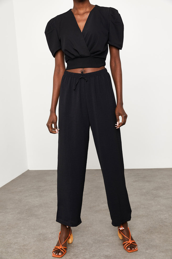 بنطلون كتان أسود فضفاض