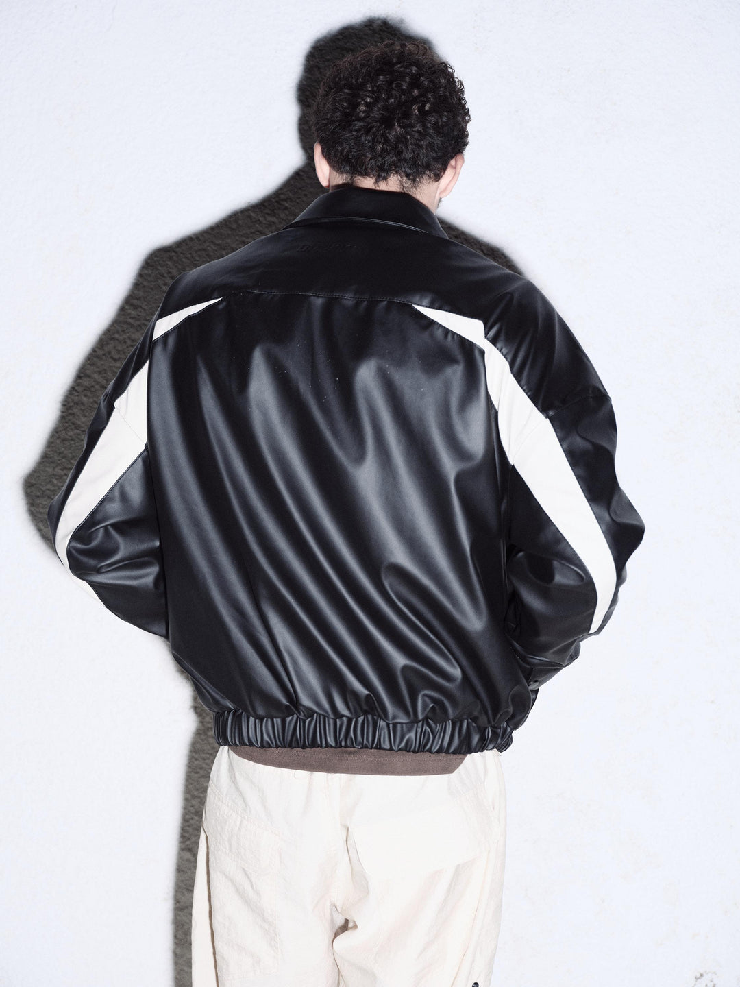 Giesto Veste en cuir noire à pièces contrastées - Noir