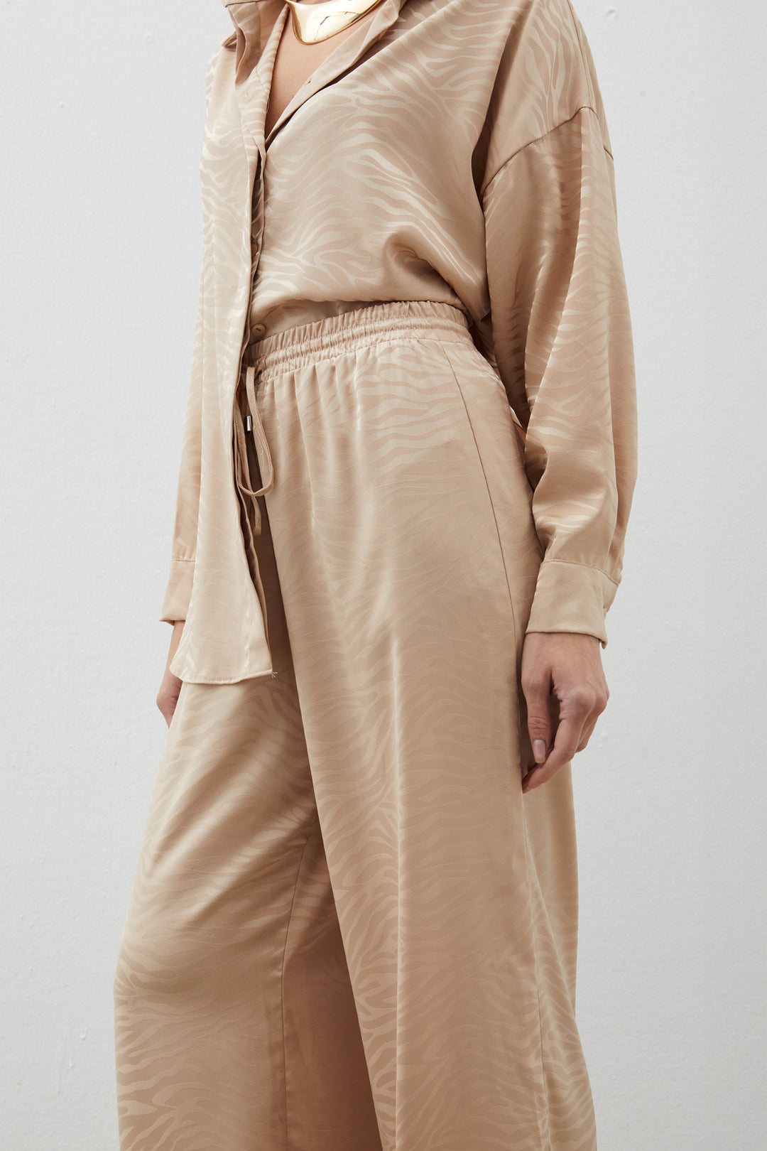 Sateen Pantalon ample à motifs zèbre - Beige